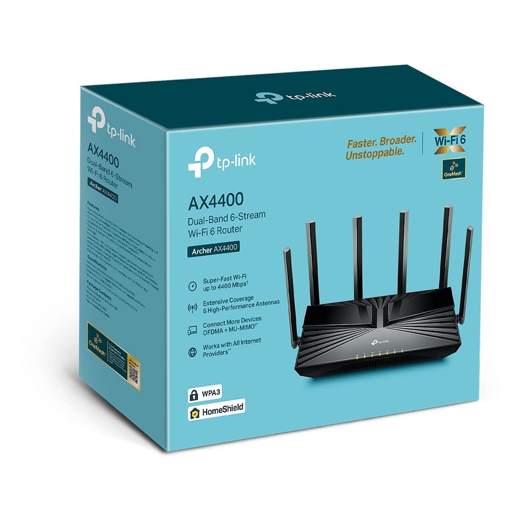 TP‑Link Archer AX4400 placed in living room demonstrating stronger whole‑home Wi‑Fi