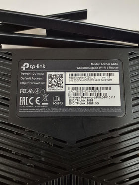 TP-Link Archer AX50 renewed packaging and handset showing inspected like‑new condition