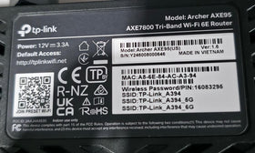 TP-Link Archer AXE7800 on a desk setup ready for fast home networking