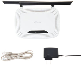 TP-Link TL-WR841N in-use in a cozy home office setup.