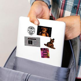 Five Nights at Freddy’s decal on notebook for personal expression.