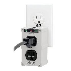 TRIPP LITE plugged into a garage outlet demonstrating compact placement and convenience