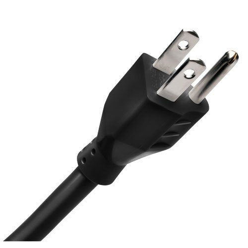 Tripp Lite PS66B held next to a hand to show compact size and easy placement benefit