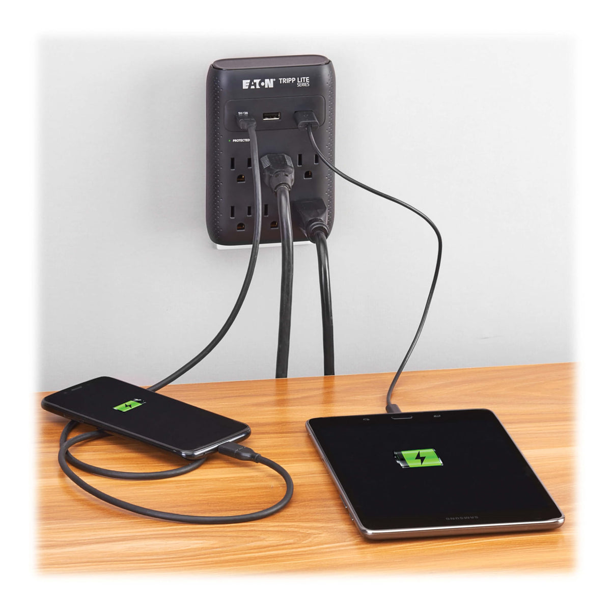 TRIPP LITE SK60CB plugged into wall to reduce cord clutter in home office