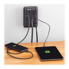 TRIPP LITE SK60CB plugged into wall to reduce cord clutter in home office