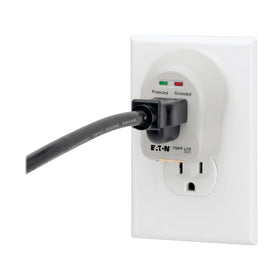 TRIPP LITE SpikeCube travel-size surge protector fits behind furniture.