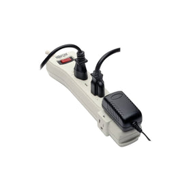 TRIPP LITE beside router and monitor showing size and capacity benefit