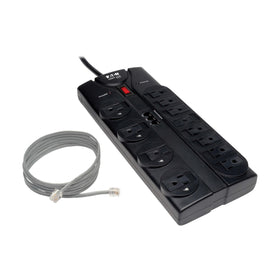 TRIPP LITE side profile beside couch, flat plug keeps furniture flush to wall
