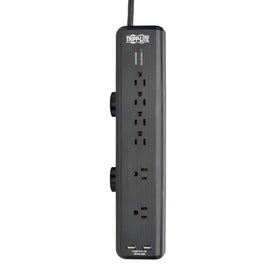 Tripp Lite in a home office scene protecting computer and charging mobile devices