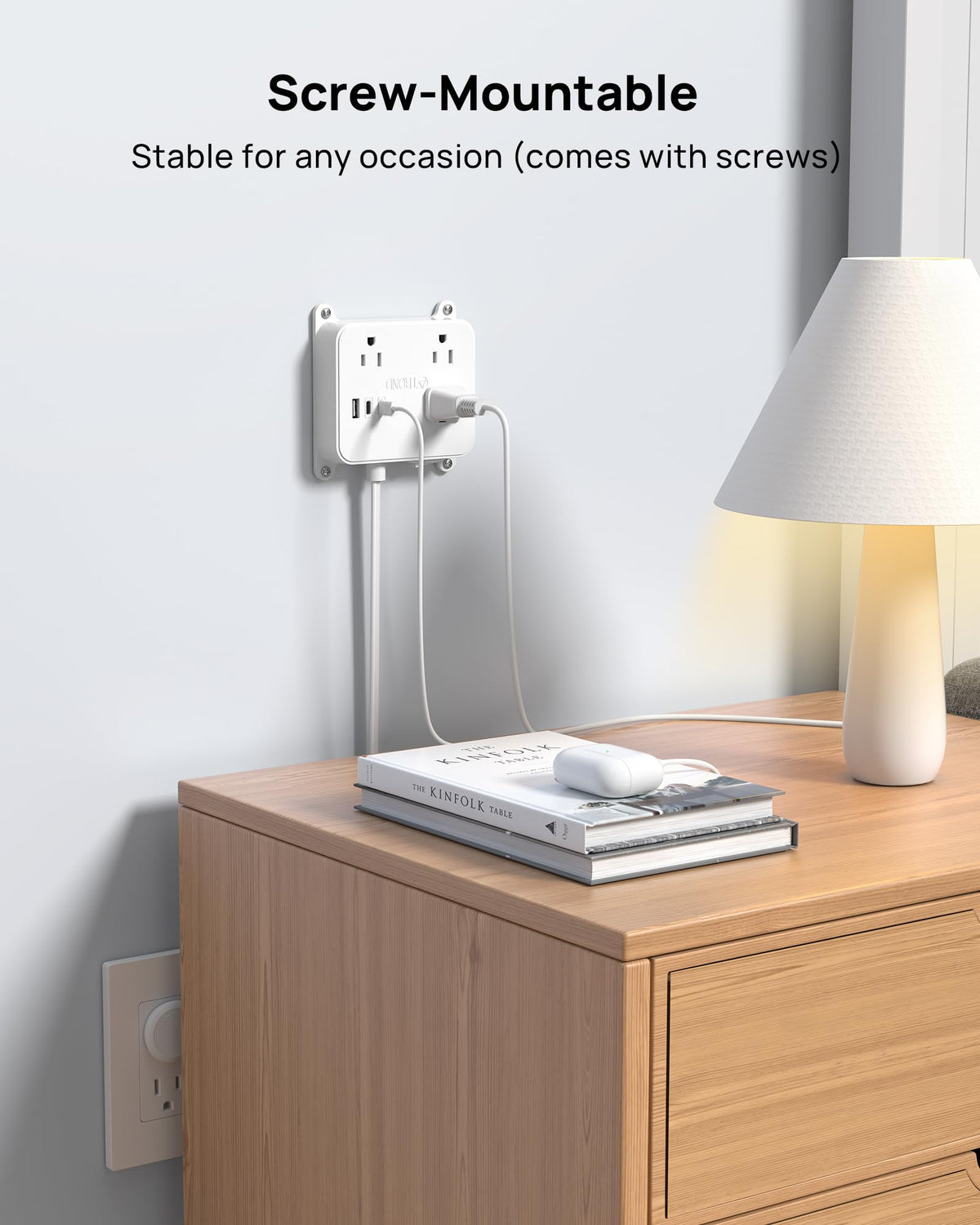 TROND 45-degree flat plug tucked behind sofa for tight spaces