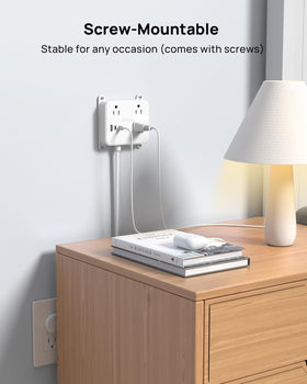 TROND 45-degree flat plug tucked behind sofa for tight spaces