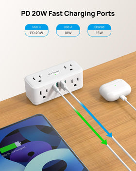 TROND mounted on a wood desk with laptop and lamp — keeps workspace organized