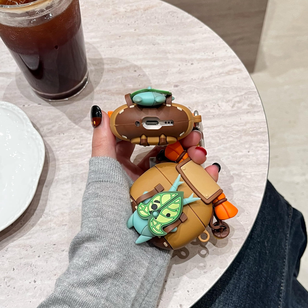 TSVSXS Korok case held in hand for scale and lightweight comfortable feel