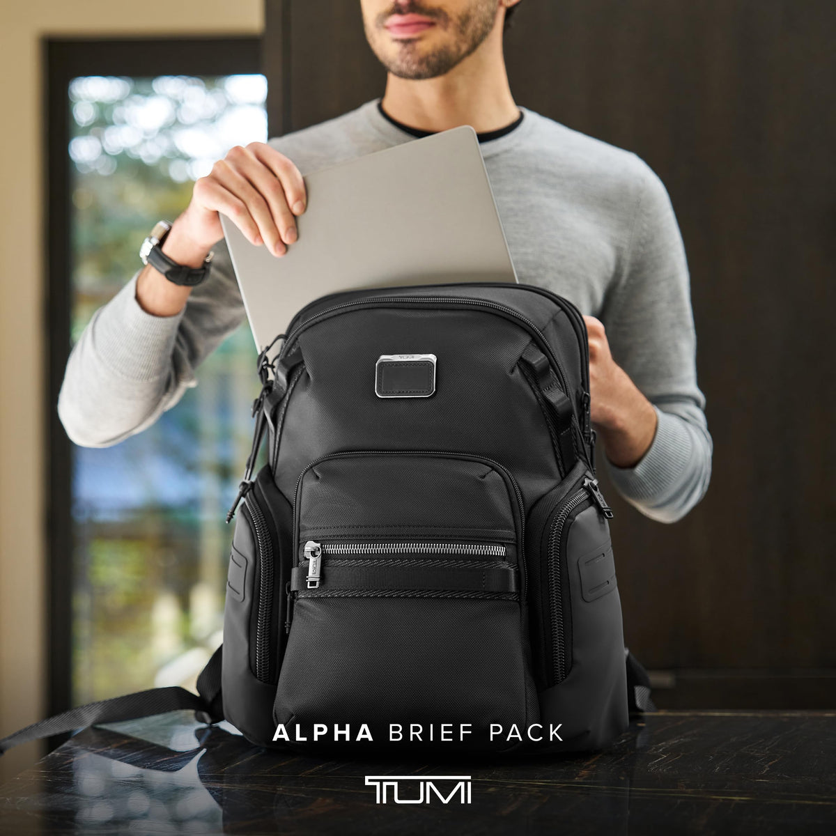 TUMI Alpha Brief Pack back view highlights comfort-focused design for all-day wear