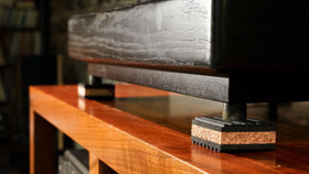 Cork pad fits under subwoofers and audio gear