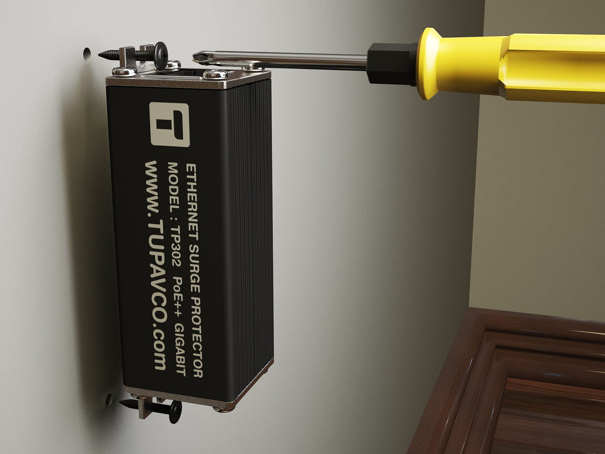 Tupavco TP302 installed on an exterior wall near network cabling to protect outdoor gear
