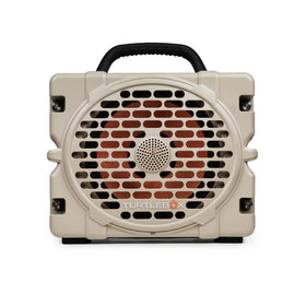 Turtlebox Grande front view with tan finish showing bold outdoor sound capability