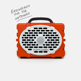 Turtlebox Original Gen 3 outdoor setup illustrates portable all-weather speaker.