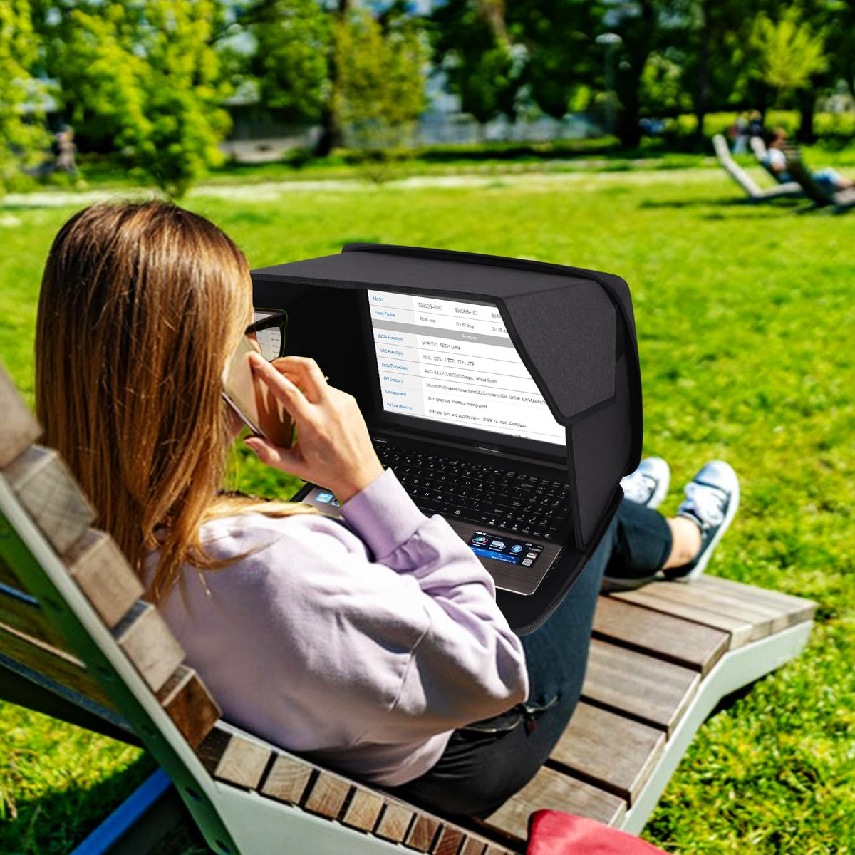 TUSIASC next to 13-inch laptop to show fit and scale for buyers