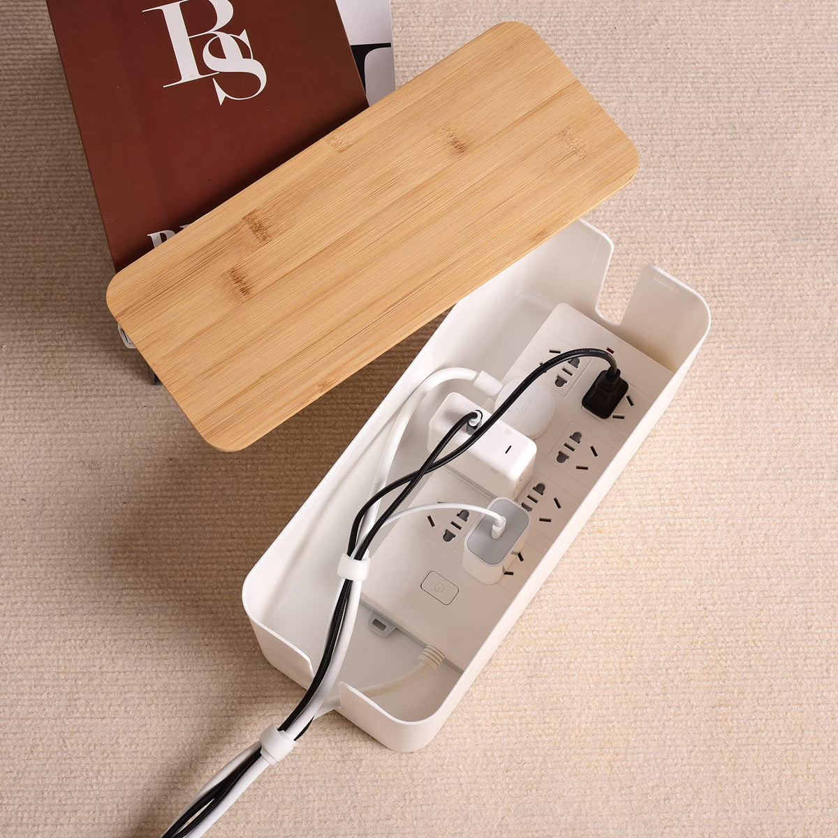 TuweChen cable box on desk with cords, creating a tidy workspace.