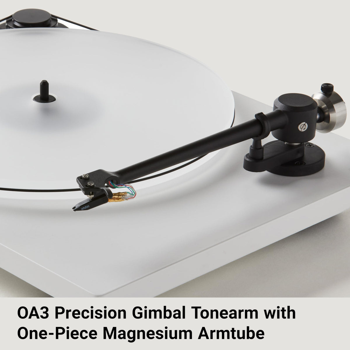 Orbit Plus Gen 2 acrylic platter closeup emphasizes speed consistency and detailed playback.
