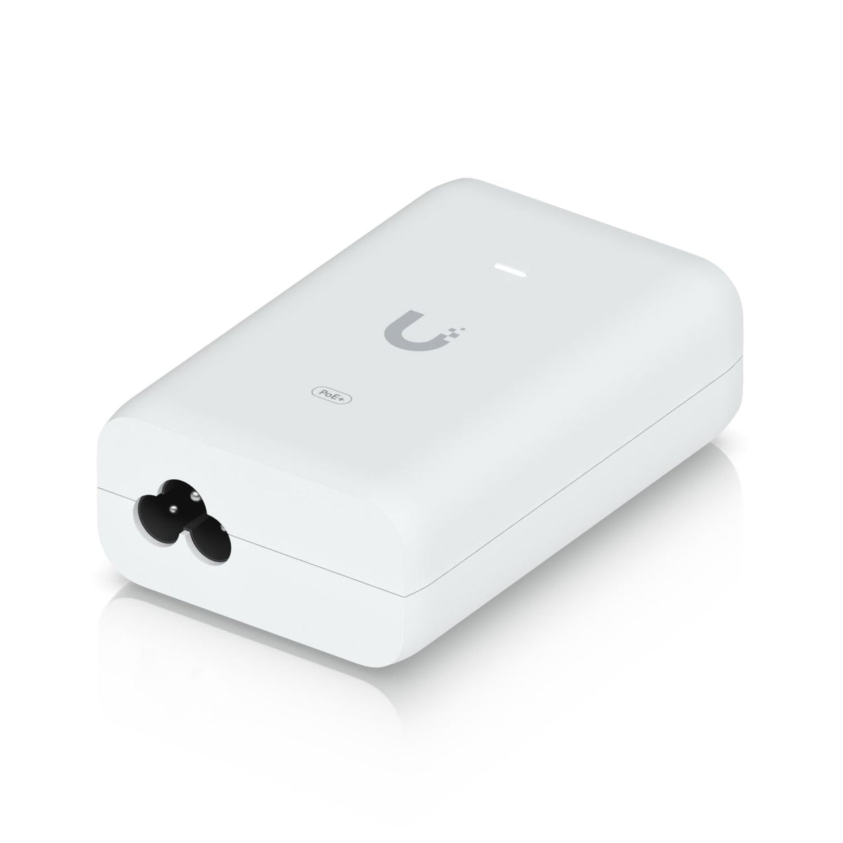 Ubiquiti PoE+ adapter compact size shown next to a ruler for space-saving installation
