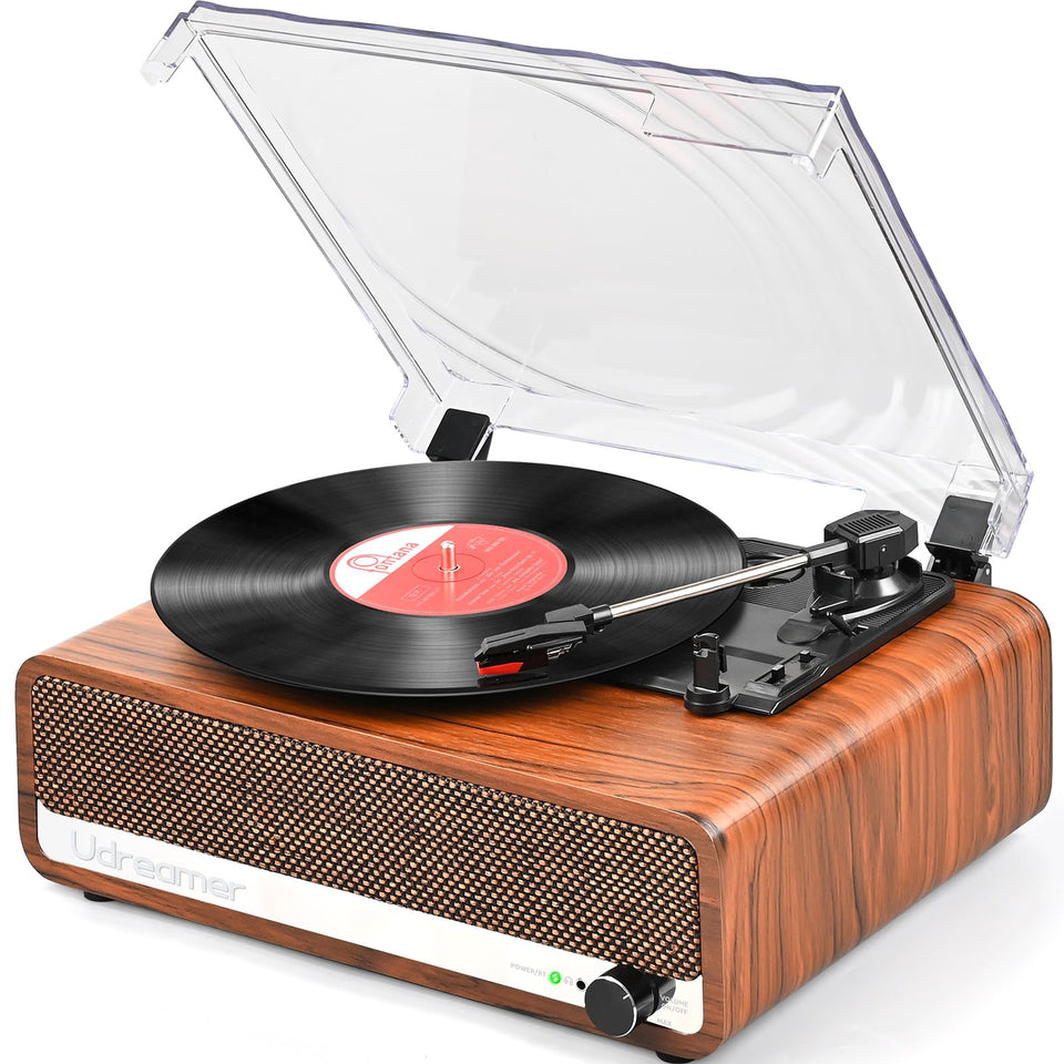Udreamer vinyl record player with mirror wood finish enhances vintage decor and warm ambiance.