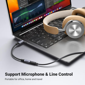 UGREEN 24bit 96kHz capable DAC dongle enhances music quality.