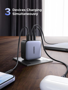 UGREEN closeup of two USB-C and one USB-A ports, versatile charging benefit