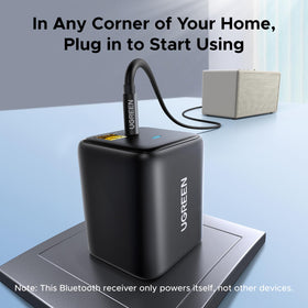 UGREEN connected to TV via AUX cable enabling wireless audio playback