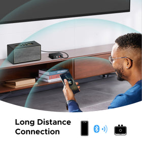 UGREEN in a living room lifestyle scene with speakers, showing modern audio integration benefit