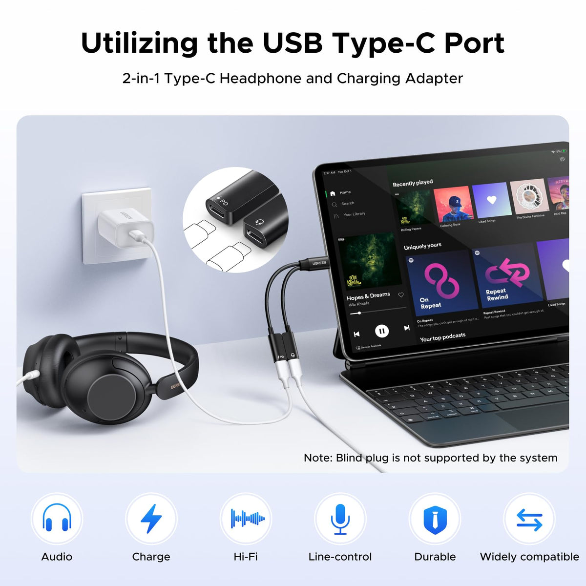 UGREEN magnetic USB-C splitter in use with headphones and charger for simultaneous audio and power.