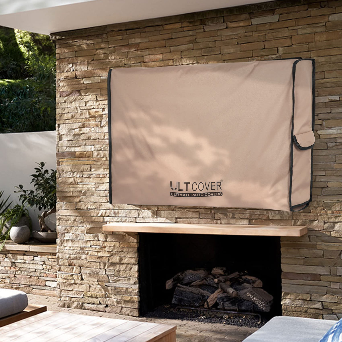 ULTCOVER on patio TV in lifestyle setting demonstrating all-weather protection benefit