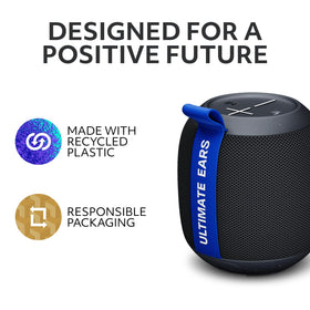 Ultimate Ears WONDERBOOM PLAY on a beach towel illustrating outdoor use and rugged portability