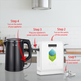 UMI 2400W converter in kitchen use powering a coffee maker at 220V.