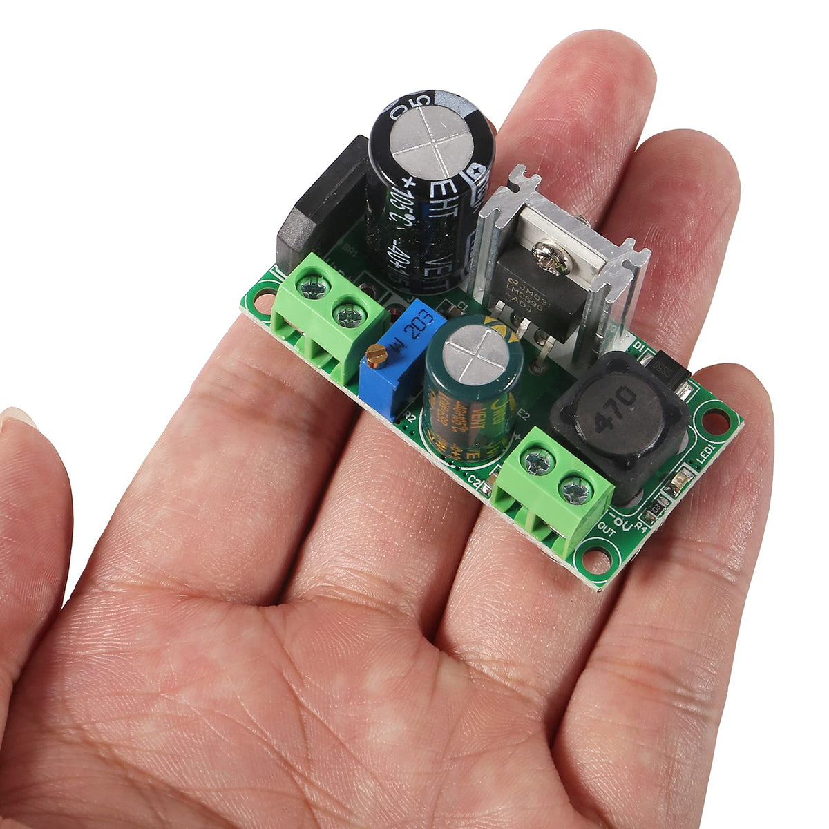 UMLIFE module beside coin showing compact size for flexible mounting