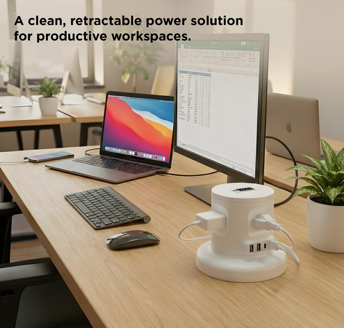 Uncaged Ergonomics on a desk charging multiple devices for a tidy workspace