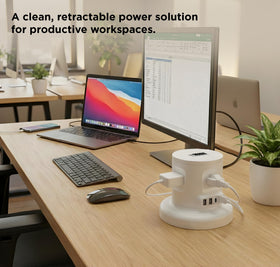 Uncaged Ergonomics on a desk charging multiple devices for a tidy workspace