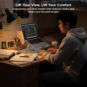 Uncaged Ergonomics Portable desk stand collapses for a tidy home workspace.