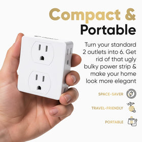 Unidapt on a hotel nightstand with phone and lamp plugged in for travel convenience
