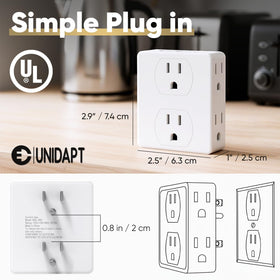 Unidapt held in hand to show compact size and easy portability for trips