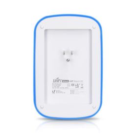 UniFi Wall Plug Extender on a living room wall illustrating broad reach.