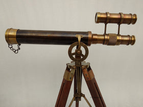 US HANDICRAFTS telescope on desk enhances a maritime-inspired study area