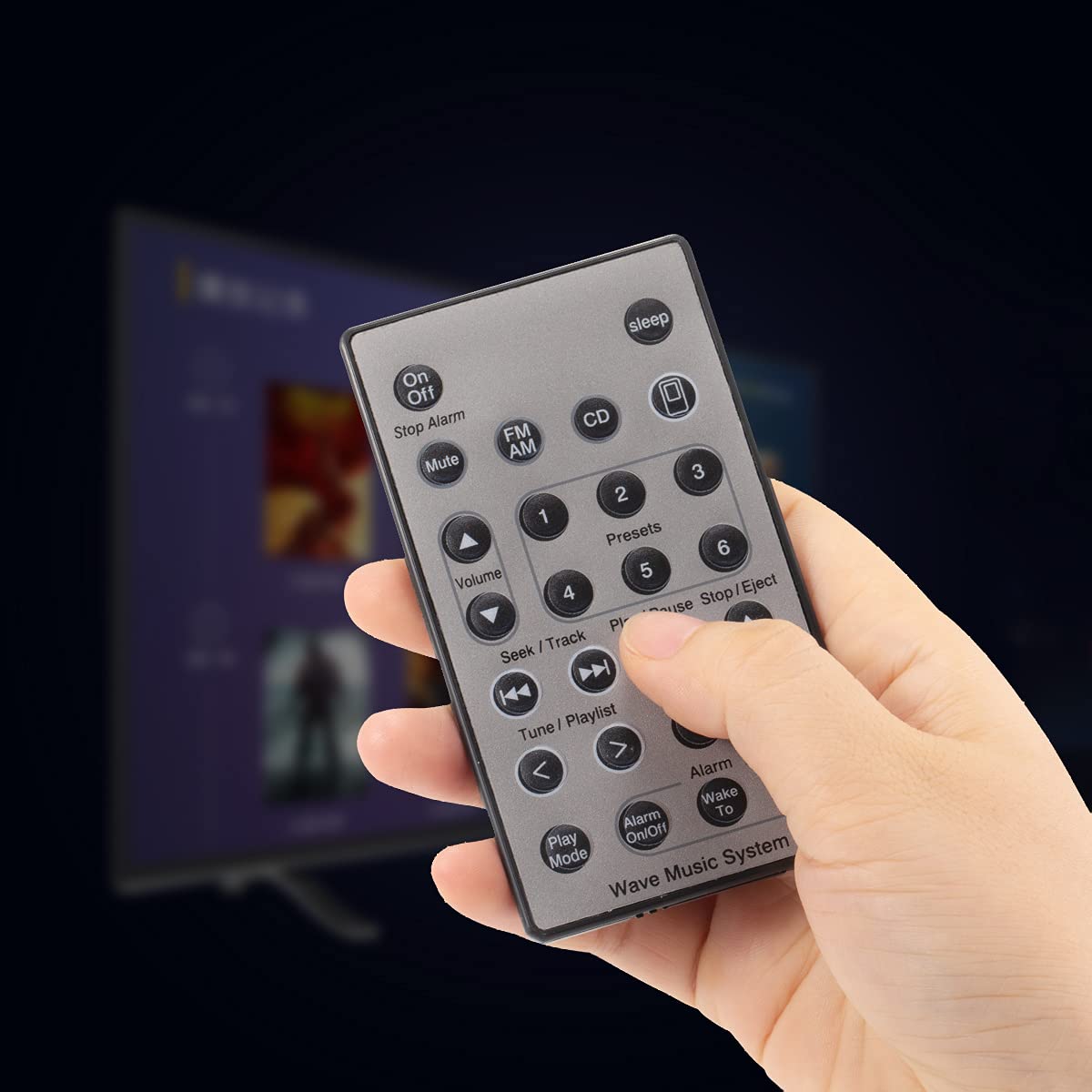 Uyibii Bose Wave remote silver buttons close-up showing responsive action