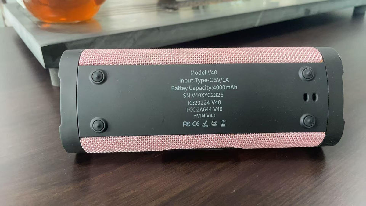 Vanzon held in hand for size comparison showing compact, lightweight design