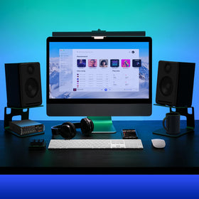Vaydeer in-use on desktop stereo setup improving imaging and freeing desk space