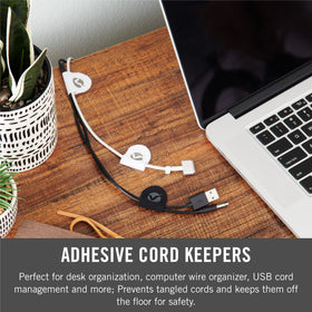 VELCRO Brand Cord Keepers with adhesive secure wires along a wall safely.