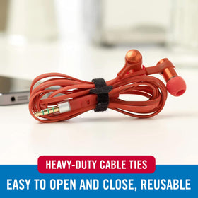 VELCRO Brand reusable cable ties in use to bundle computer and power cables.