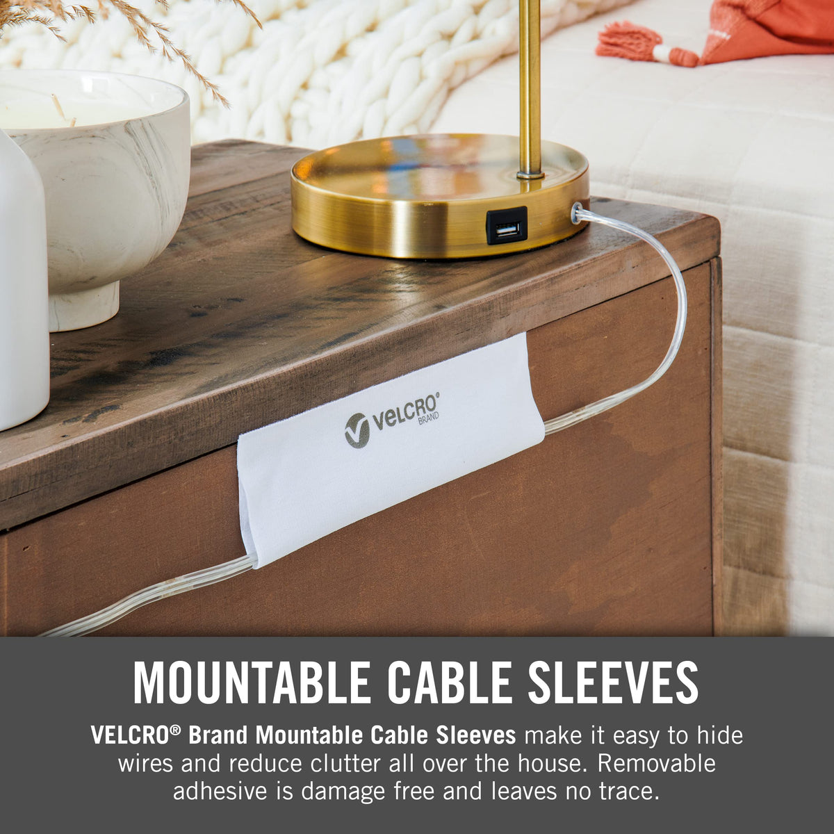 VELCRO Brand sleeve installed under desk organizing power and peripheral cables to reduce clutter