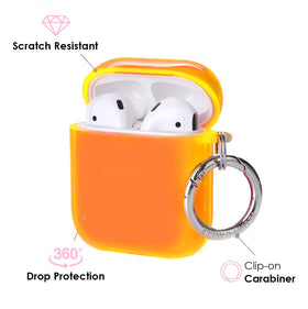 VELVET CAVIAR AirPods case neon orange with built-in keychain for secure carrying.